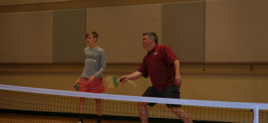 father and son playing pickleball in trussville alabama, alabama pickleball, trussville pickleball, birmingham pickleball